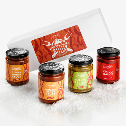 Unser Präsent Wintergrillen, Karton mit vier Gläsern im Schnee